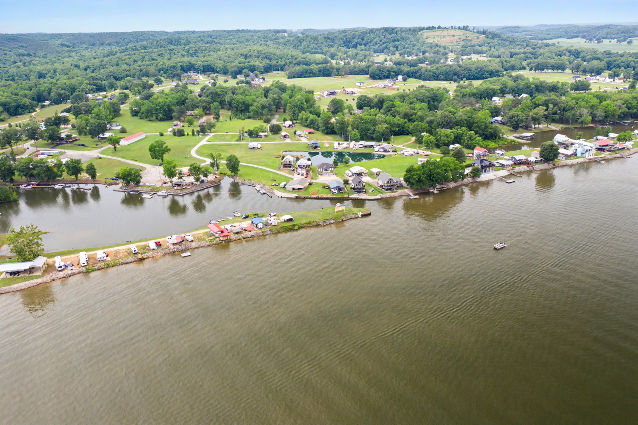 175 Ellen Lane Decaturville, TN 38329 - Photo 6 of 25 an aerial view of a city with lake view