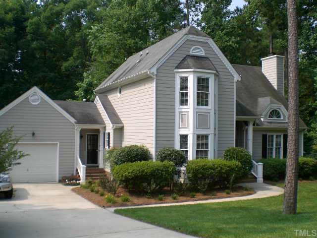 11915 Radner Way Raleigh, NC 27613 - Photo 1 of 1 a front view of a house with a yard and garage
