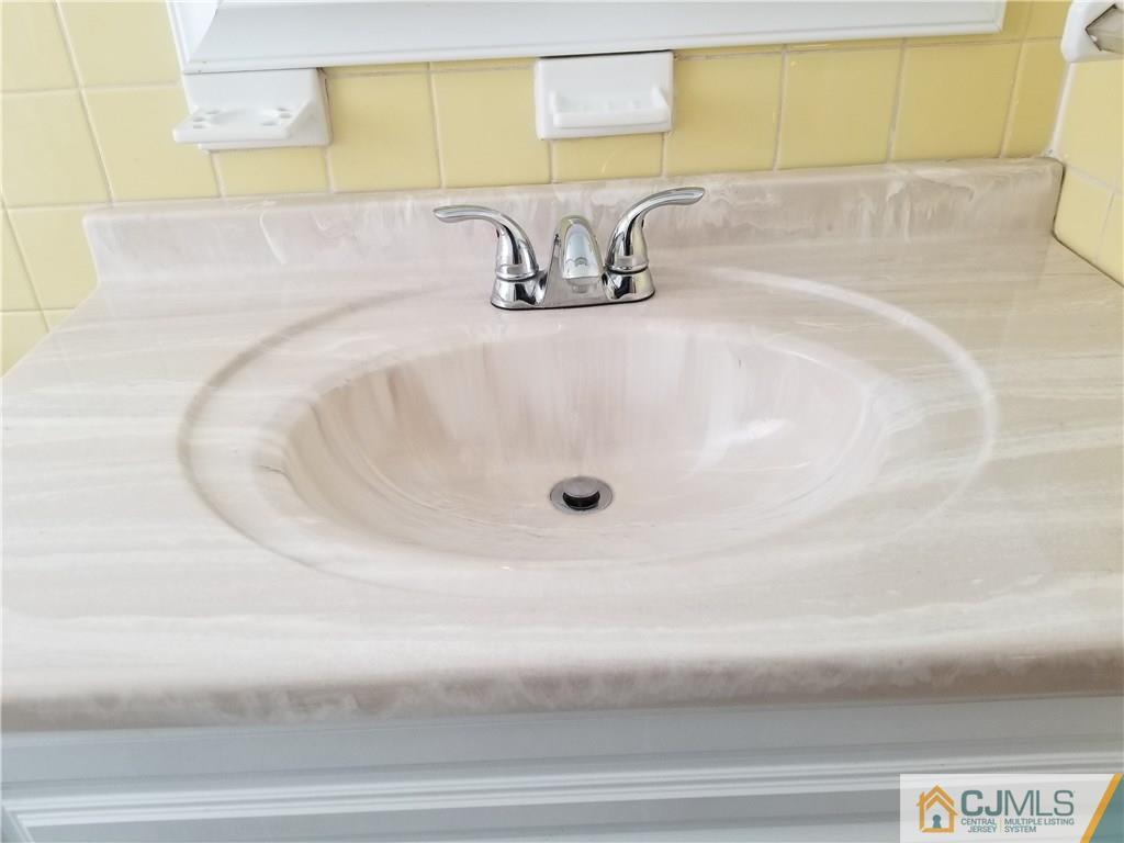 197 Evergreen Road, Unit 5B Edison, NJ 08837 - Photo 7 of 11 a close view of a sink in a bathroom