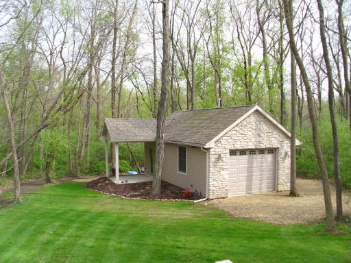4174 River Ridge Sandwich, IL 60548 - Photo 14 of 16 front view of a house with a yard