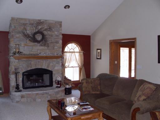 4174 River Ridge Sandwich, IL 60548 - Photo 3 of 16 a living room with furniture and a fireplace