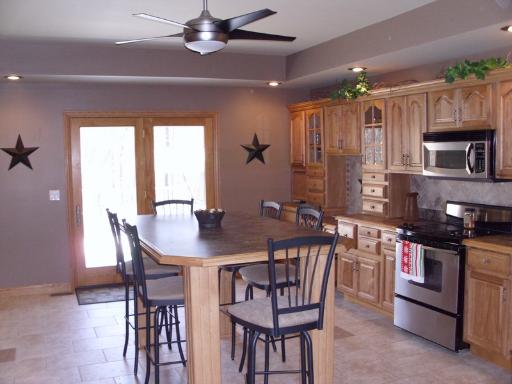 4174 River Ridge Sandwich, IL 60548 - Photo 6 of 16 a view of a dining room with furniture window and wooden floor