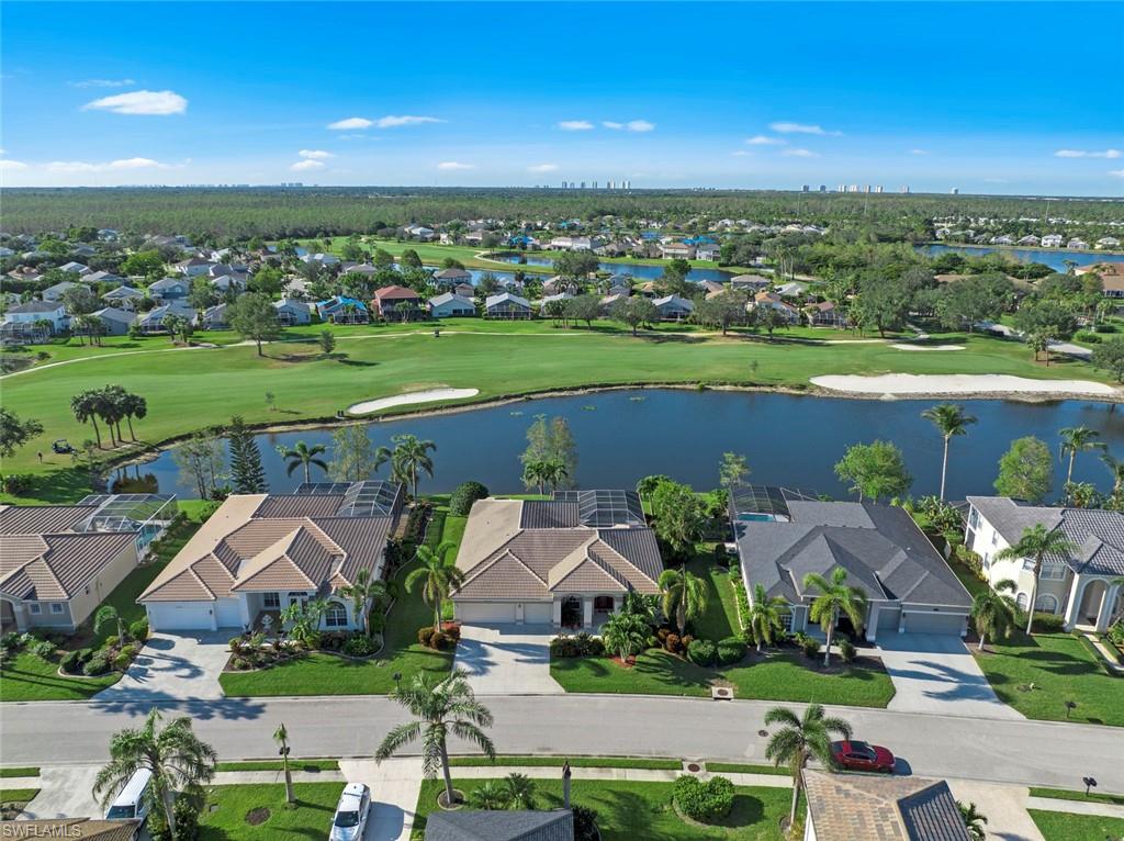 21516 Langholm Run Estero, FL 33928 - Photo 38 of 50 an aerial view of a house with a garden
