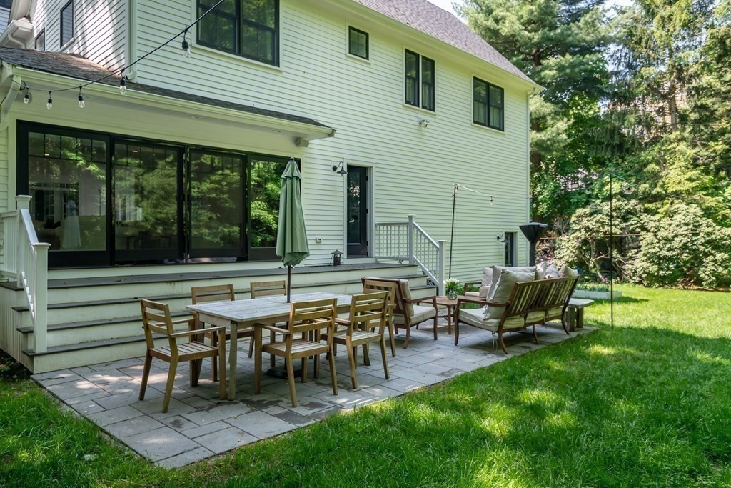 68 Crest Road Wellesley, MA 02482 - Photo 2 of 4 a view of a house with backyard and sitting area
