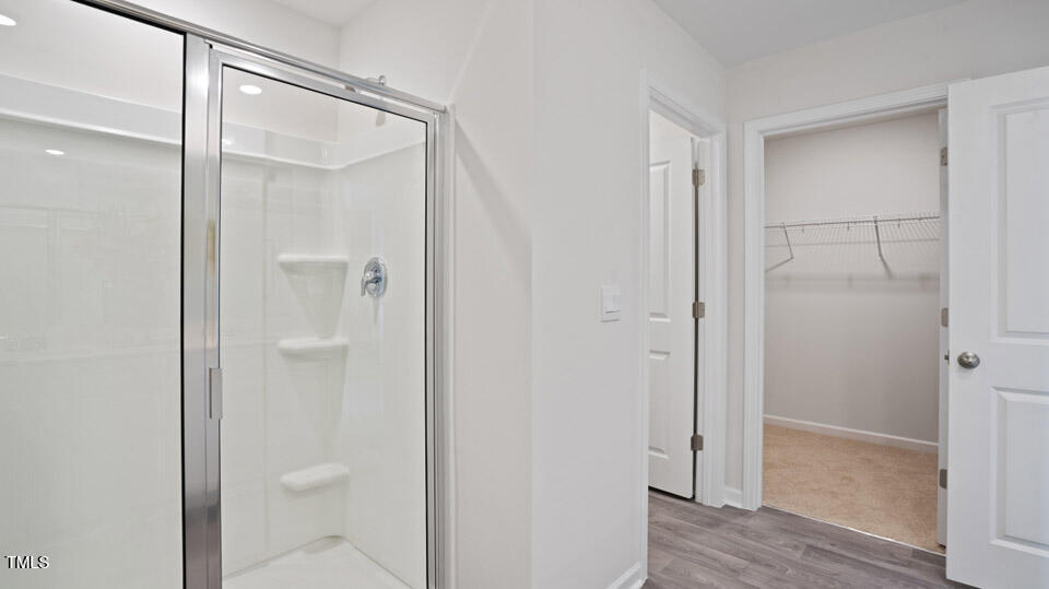 121 Daniel Road Wilson's Mills, NC 27577 - Photo 32 of 38 a bathroom that has a glass shower door