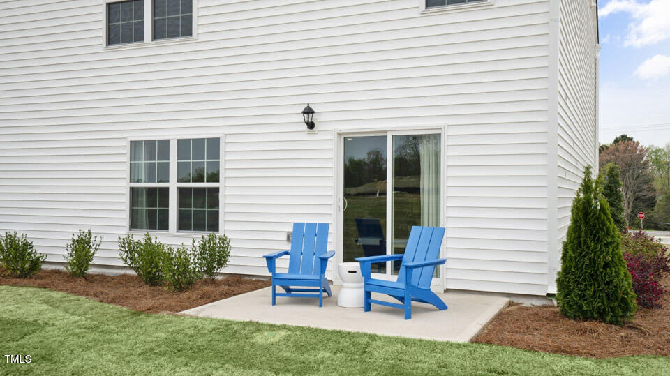 121 Daniel Road Wilson's Mills, NC 27577 - Photo 35 of 38 a view of a house with backyard and sitting area