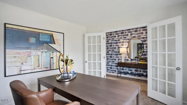 a kitchen with stainless steel appliances granite countertop a sink a stove top oven a counter space and cabinets