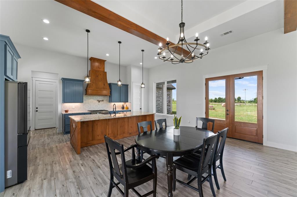 4411 Fm 751 Wills Point Wills Point, TX 75169 - Photo 19 of 40 a view of a dining room with furniture window and wooden floor