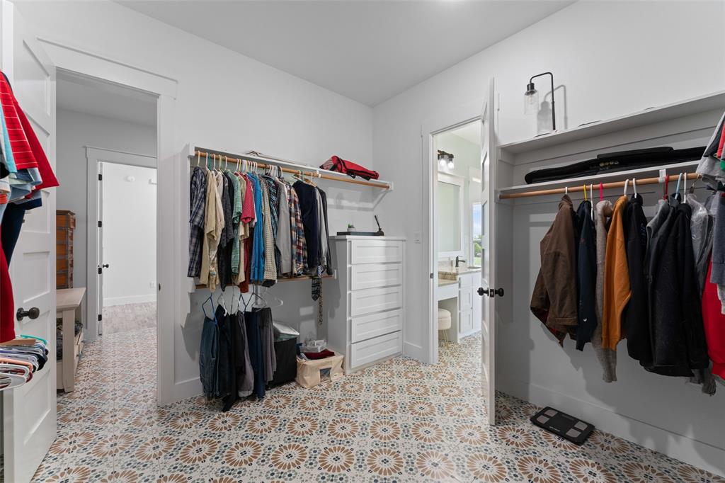 4411 Fm 751 Wills Point Wills Point, TX 75169 - Photo 28 of 40 a walk in closet with clothes and shoes