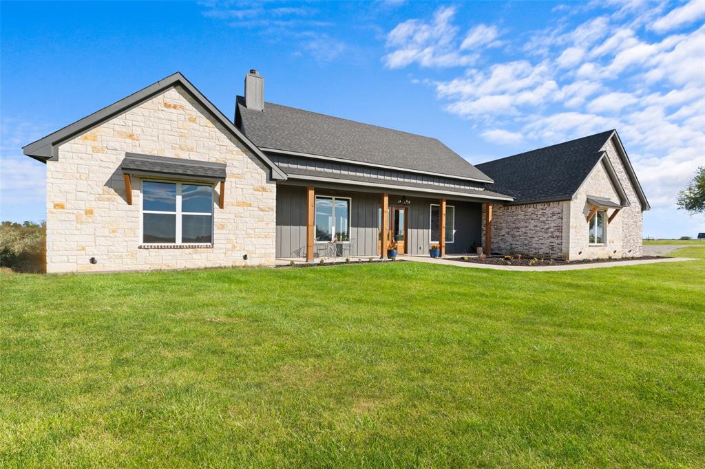 4411 Fm 751 Wills Point Wills Point, TX 75169 - Photo 9 of 40 a front view of a house with a garden
