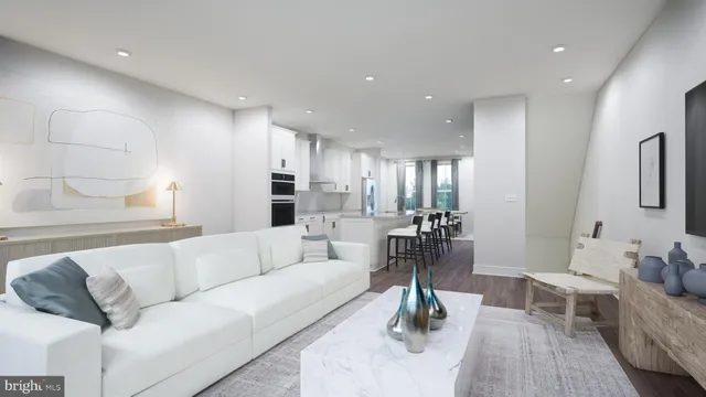 a living room with furniture and a table