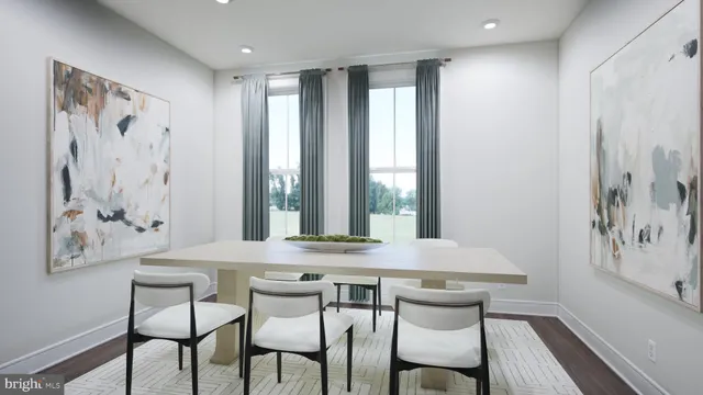 a view of a dining room with furniture and window