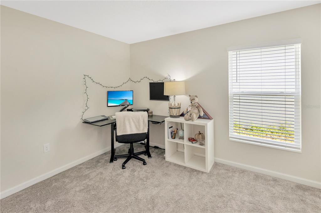 530 Patton Loop Bartow, FL 33830 - Photo 37 of 39 a workspace with furniture and a window