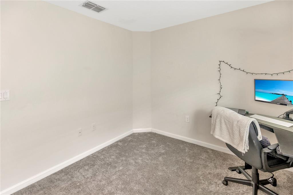 530 Patton Loop Bartow, FL 33830 - Photo 38 of 39 a view of a workspace with furniture and a wooden floor