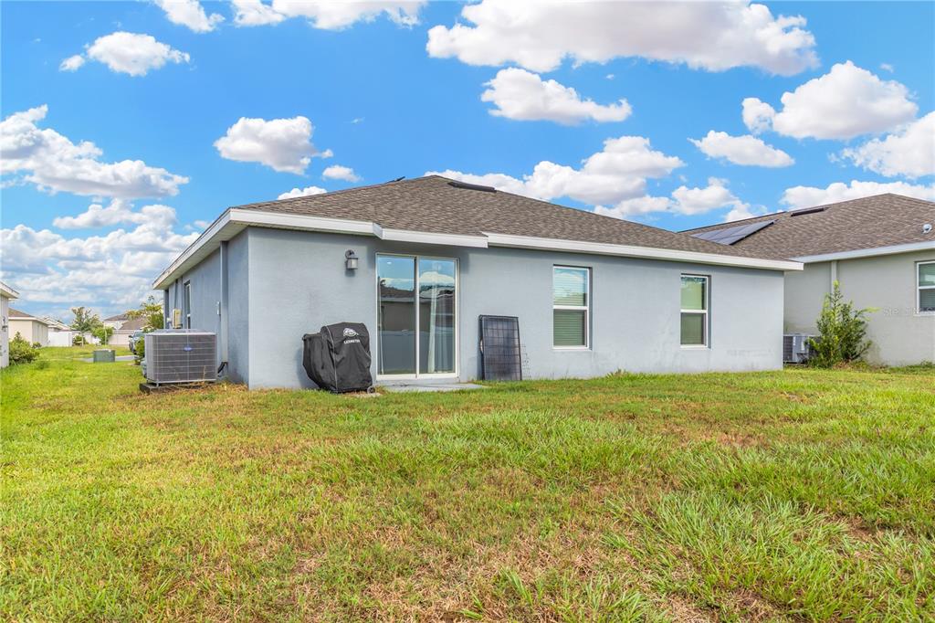 530 Patton Loop Bartow, FL 33830 - Photo 5 of 39 a view of a house with backyard