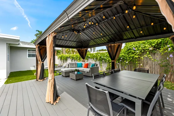 an outdoor space with furniture