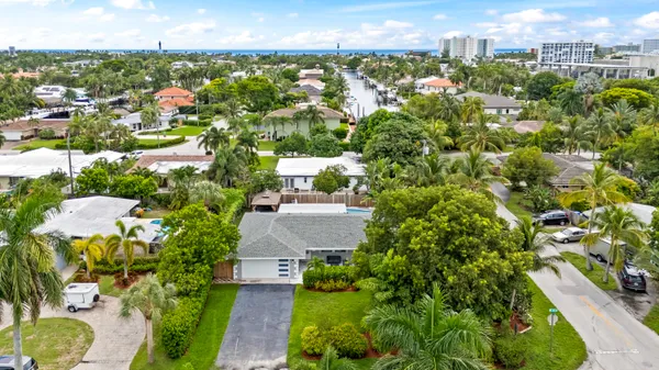 an aerial view of a house roof deck and patio