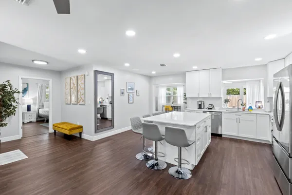 a living room with furniture and a table