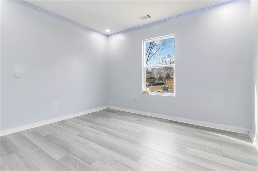 292 Natchez Circle Winder, GA 30680 - Photo 17 of 29 an empty room with a window