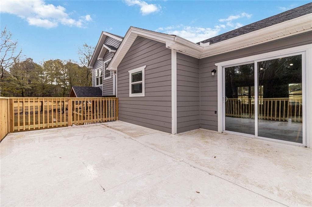 292 Natchez Circle Winder, GA 30680 - Photo 26 of 29 a view of backyard with deck and seating space