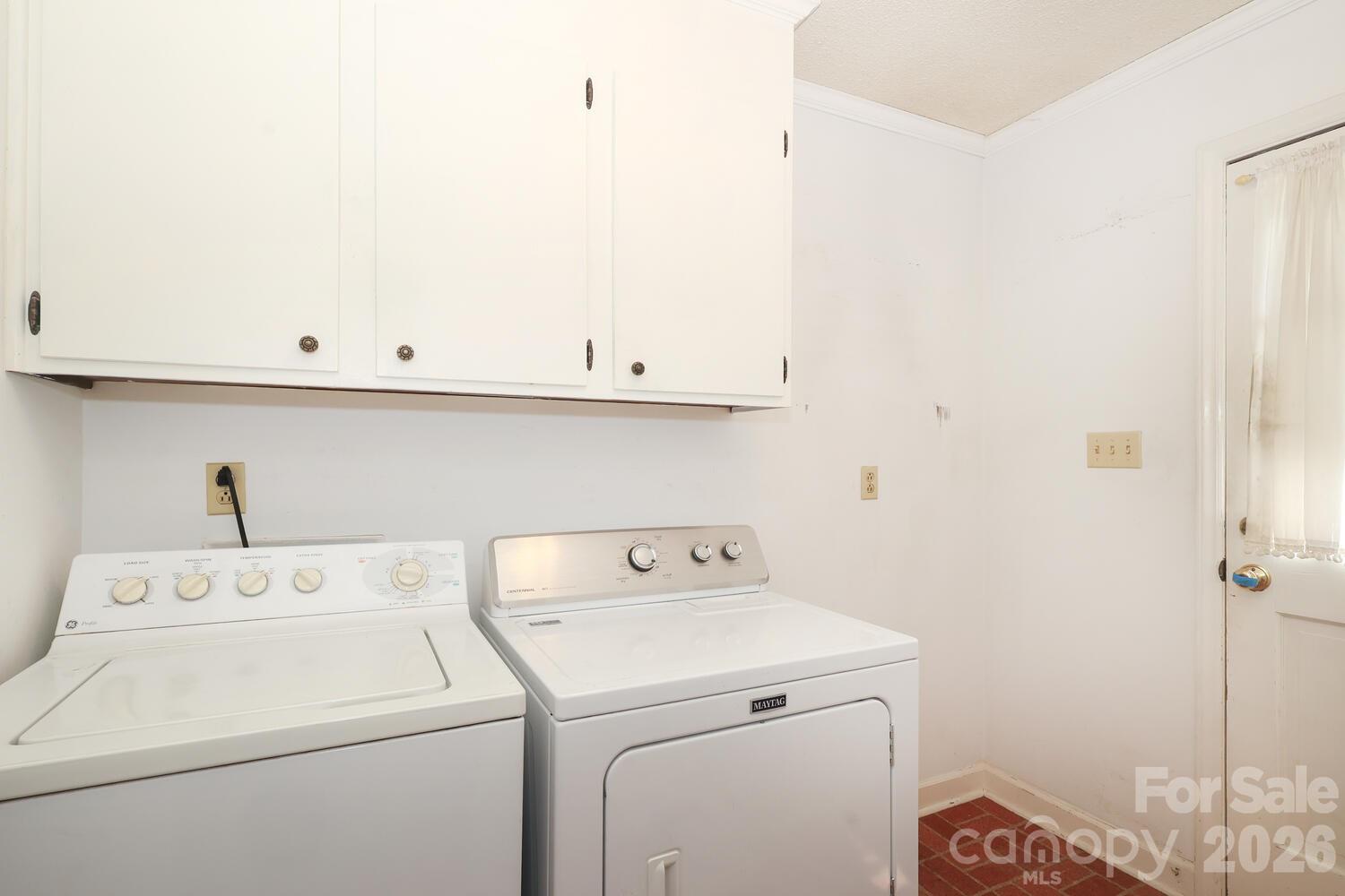 2000 Lawton Bluff Road Charlotte, NC 28226 - Photo 13 of 40 a view of storage and utility room with washer and dryer