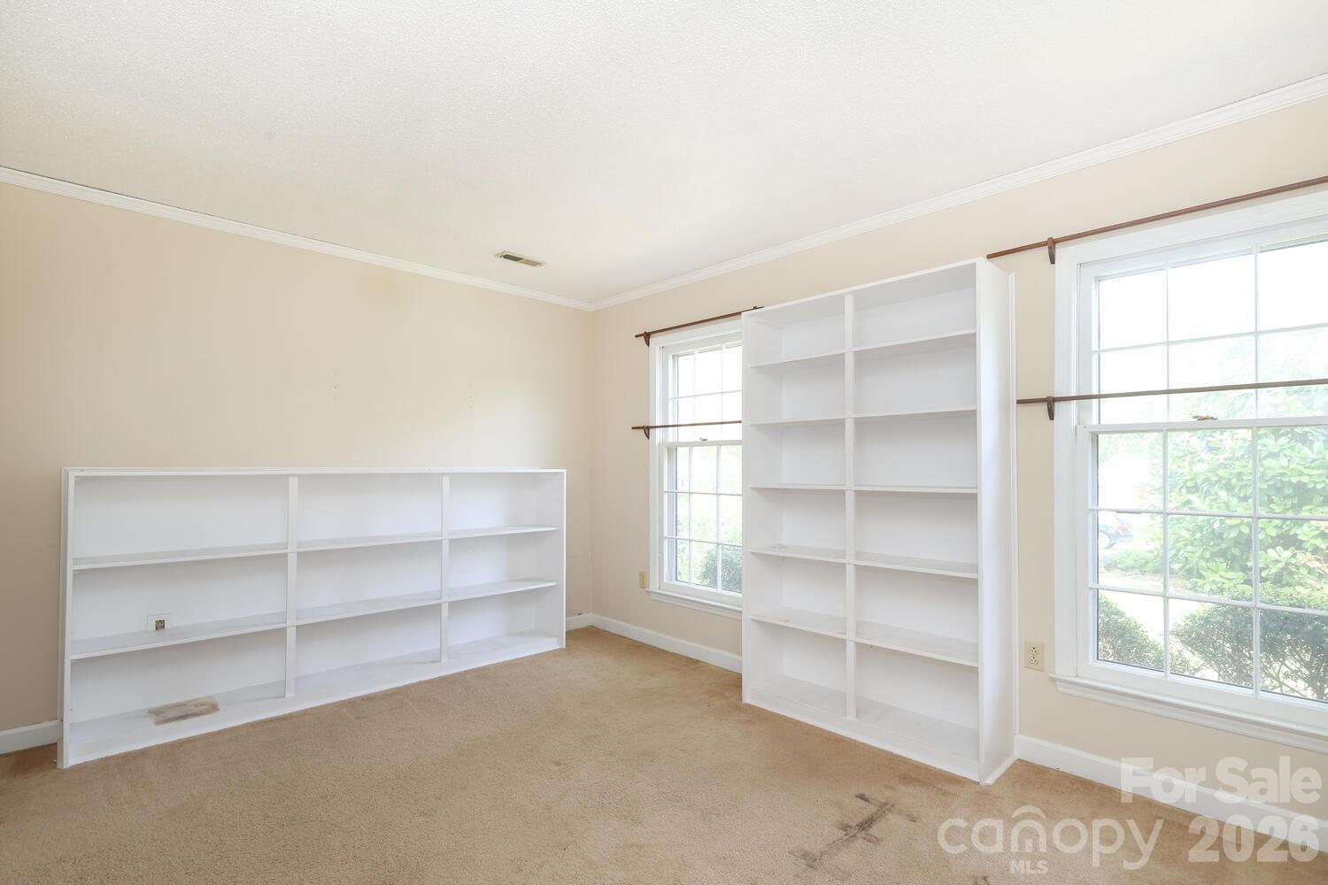 2000 Lawton Bluff Road Charlotte, NC 28226 - Photo 24 of 40 a room with a furniture and a window