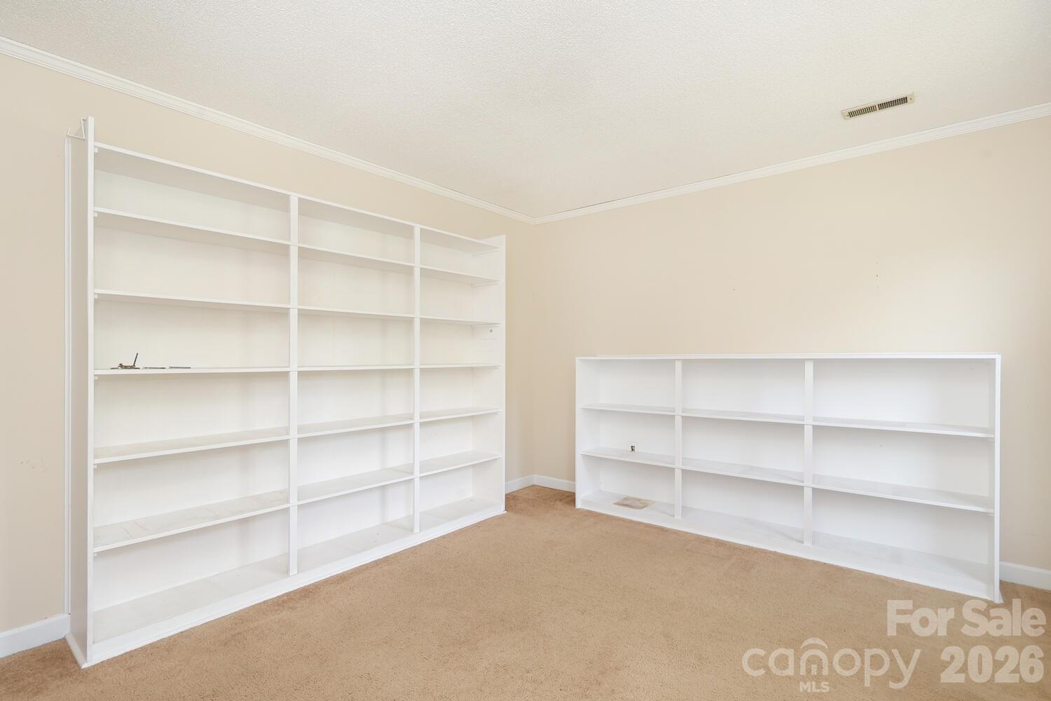 2000 Lawton Bluff Road Charlotte, NC 28226 - Photo 25 of 40 a room with cabinets and a window