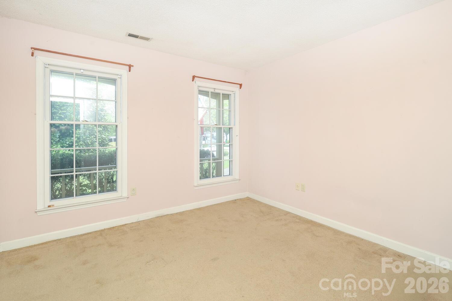 2000 Lawton Bluff Road Charlotte, NC 28226 - Photo 28 of 40 an empty room with a window