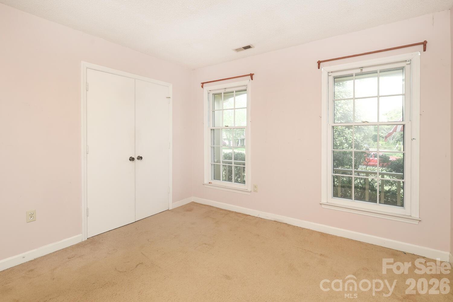 2000 Lawton Bluff Road Charlotte, NC 28226 - Photo 29 of 40 an empty room with windows