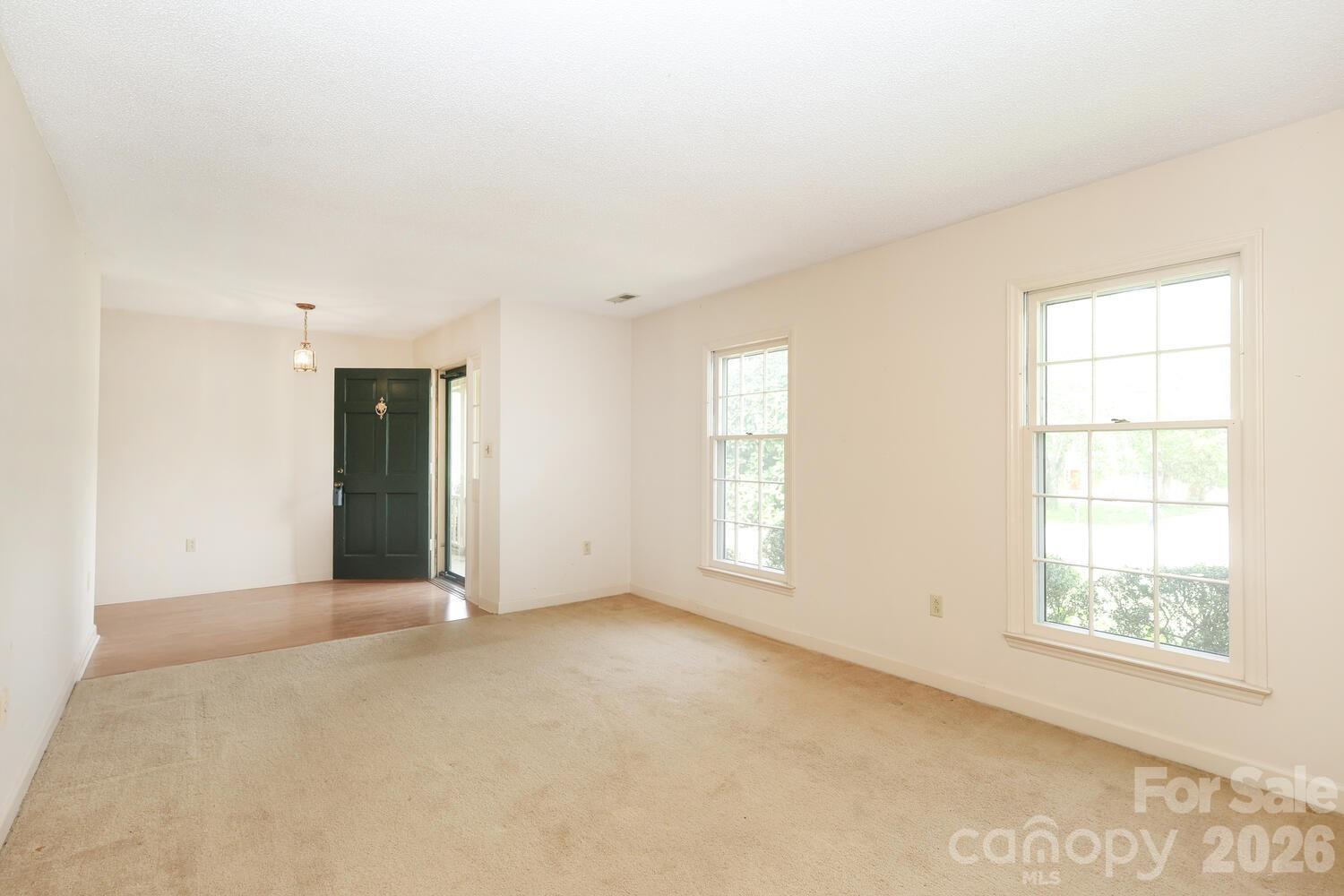 2000 Lawton Bluff Road Charlotte, NC 28226 - Photo 3 of 40 an empty room with windows