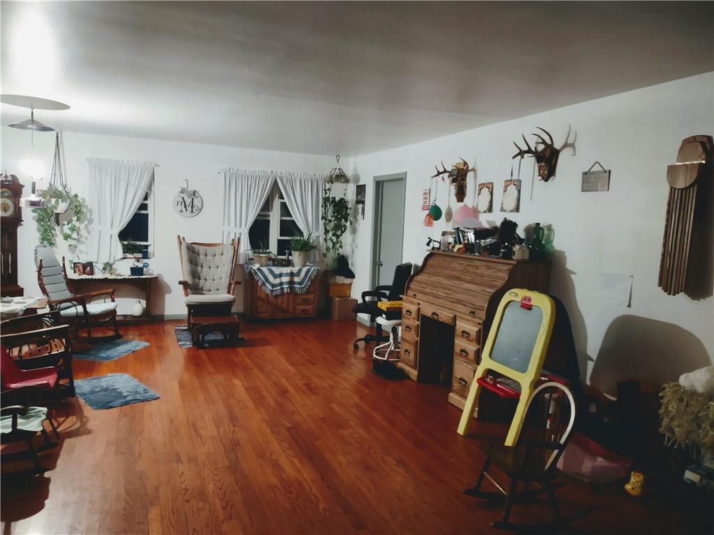 3325 Kennard Road Atlantic, PA 16111 - Photo 2 of 12 a living room with furniture and wooden floor