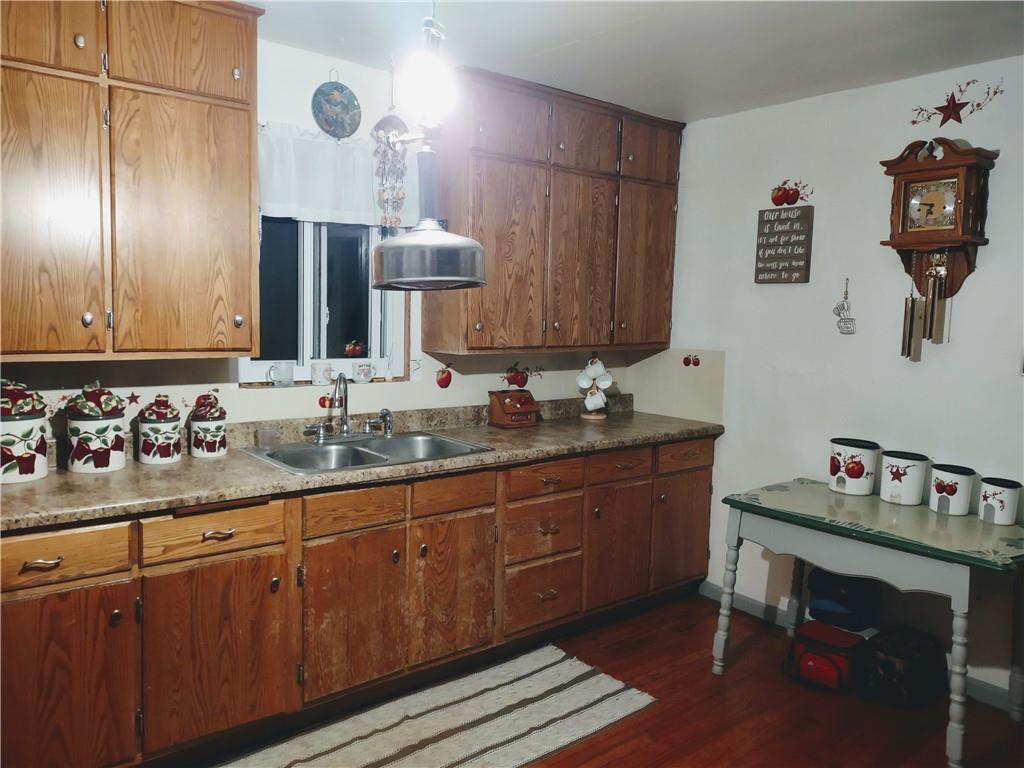 3325 Kennard Road Atlantic, PA 16111 - Photo 7 of 12 a bathroom with a sink and a mirror