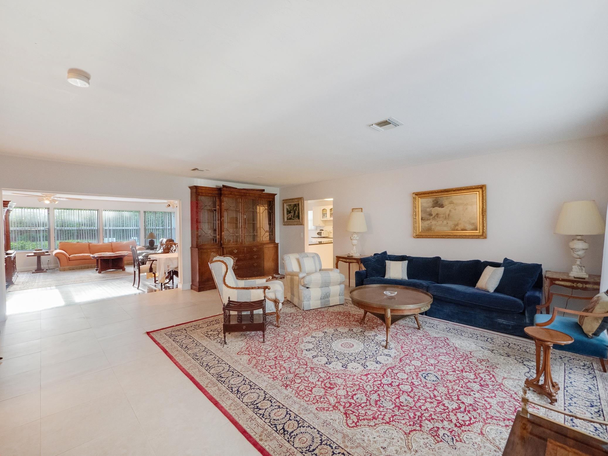 625 Atlantic Road North Palm Beach, FL 33408 - Photo 3 of 28 a living room with furniture and a rug