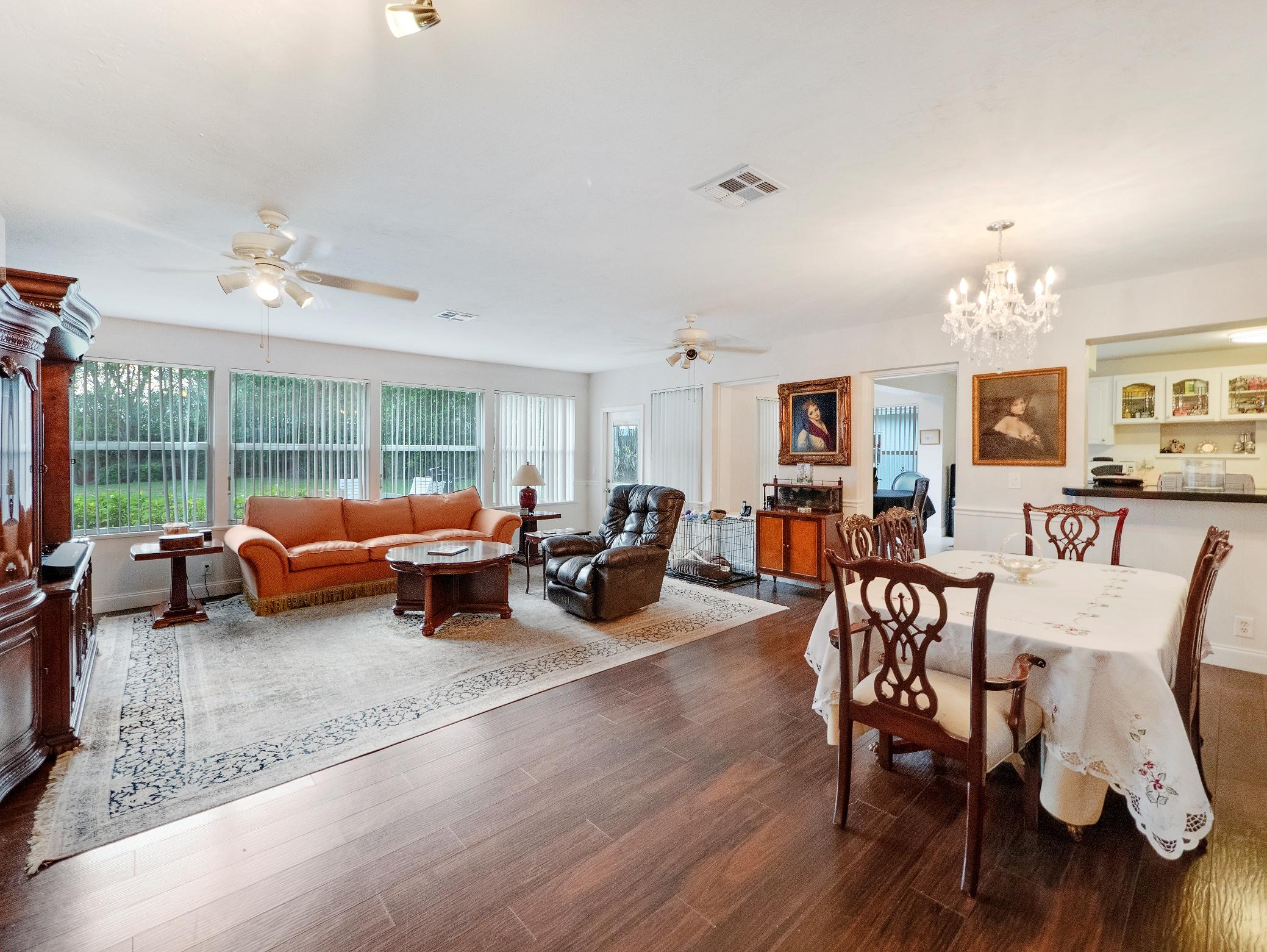 625 Atlantic Road North Palm Beach, FL 33408 - Photo 5 of 28 a living room with furniture and wooden floor