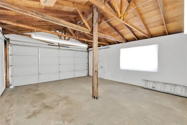 a view of a back yard of the house