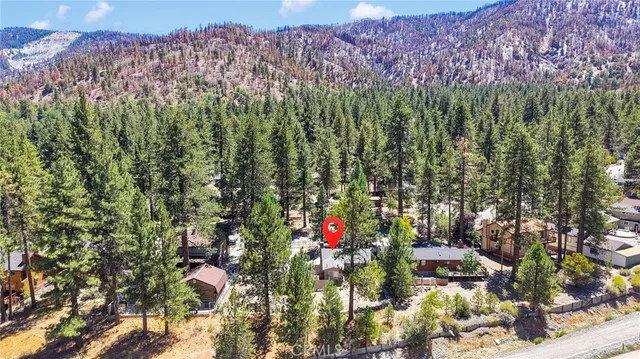 an aerial view of residential house with outdoor space