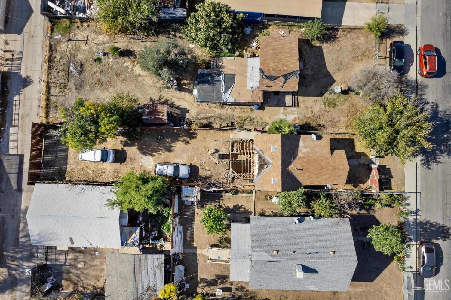 Undisclosed Address Bakersfield, CA 93305 - Photo 3 of 10 an aerial view of multiple houses with outdoor space