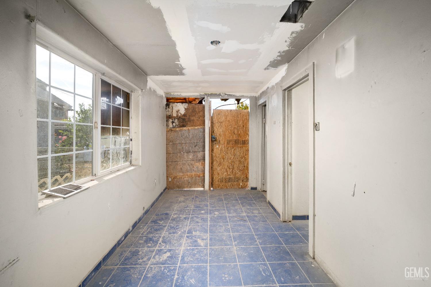 Undisclosed Address Bakersfield, CA 93305 - Photo 10 of 10 a view of a hallway with windows