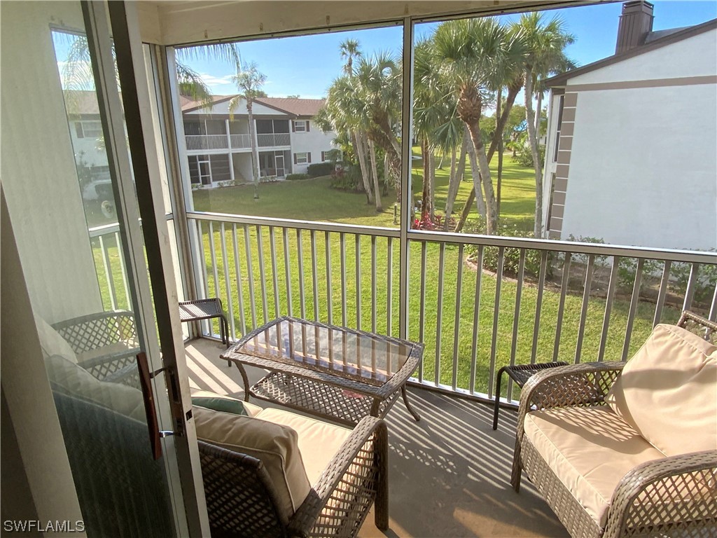 7055 New Post Road, Unit 5 North Fort Myers, FL 33917 - Photo 2 of 33 a view of balcony with furniture
