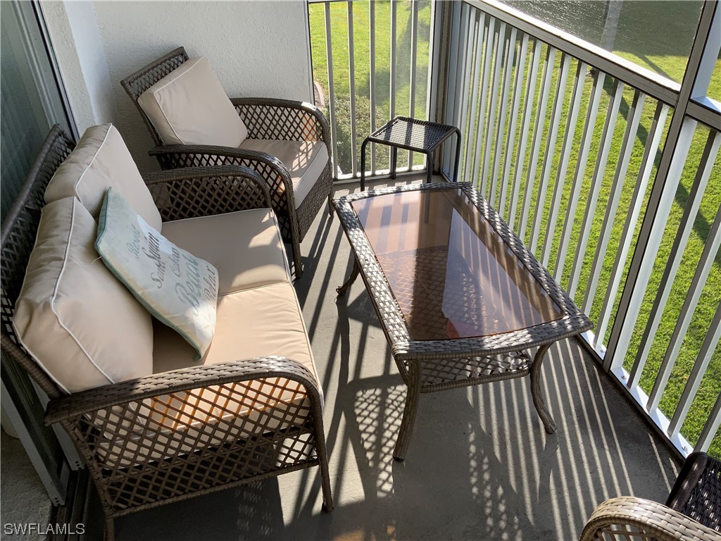 7055 New Post Road, Unit 5 North Fort Myers, FL 33917 - Photo 30 of 33 a view of balcony with furniture