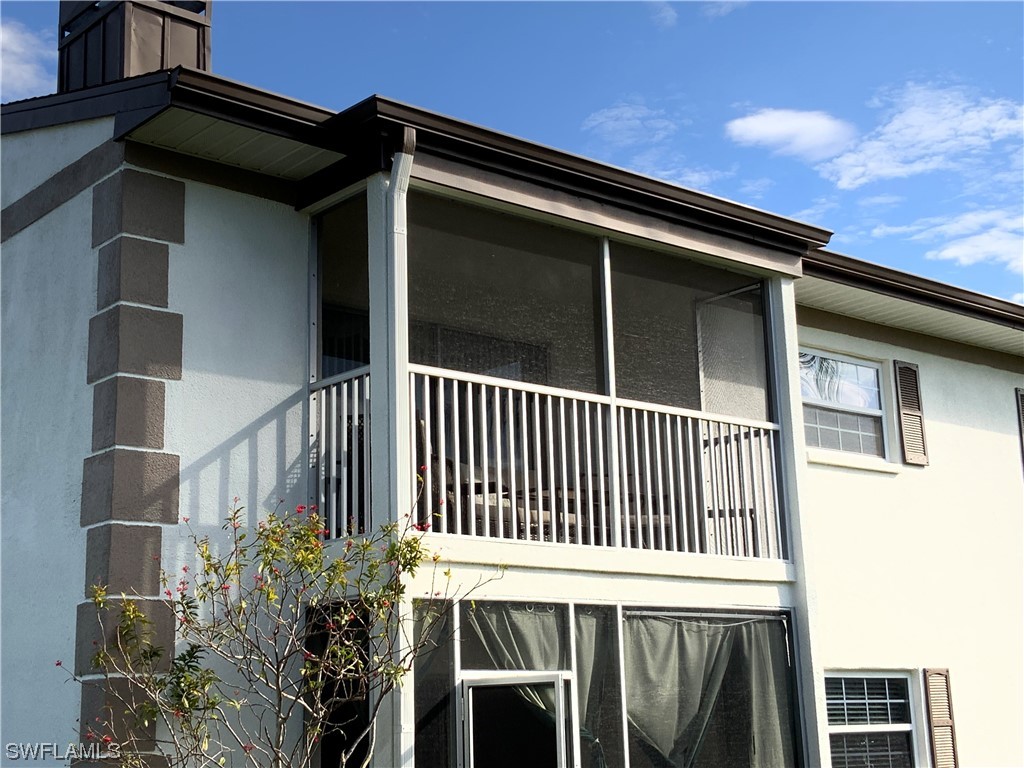 7055 New Post Road, Unit 5 North Fort Myers, FL 33917 - Photo 33 of 33 a view of a house with a deck