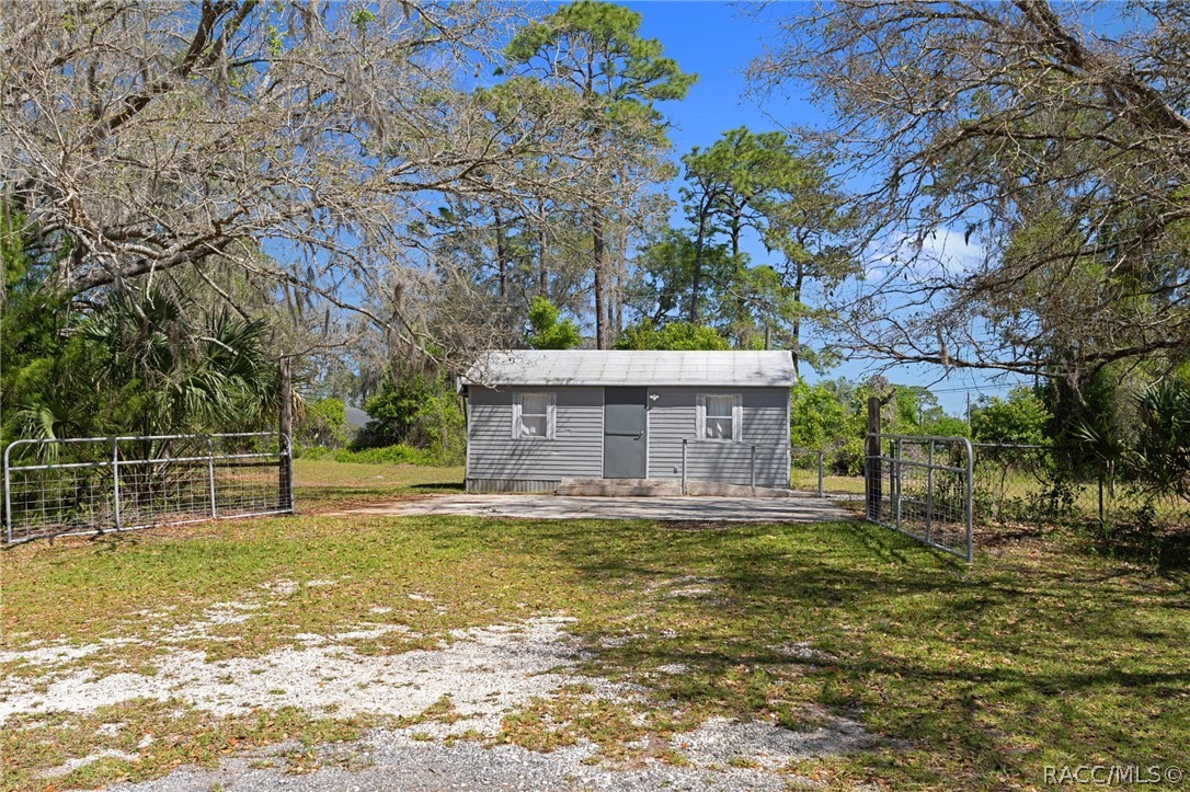4530 South Florida Avenue Inverness, FL 34450 - Photo 51 of 100 a view of a house with a yard