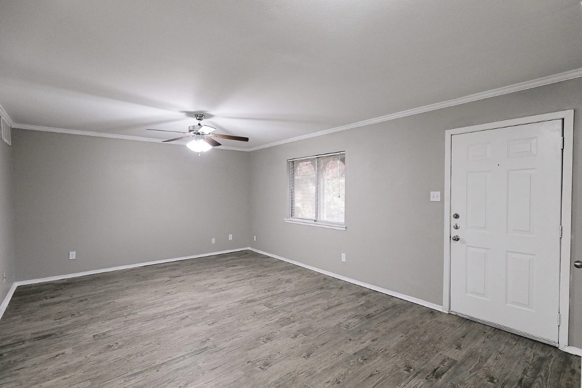 8100 North Mopac Expressway, Unit 2107 Austin, TX 78759 - Photo 12 of 23 Foyer with light wood-style flooring, crown molding, and a ceiling fan