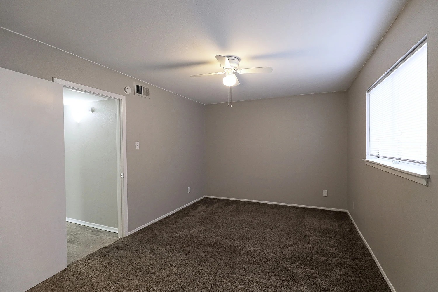 8100 North Mopac Expressway, Unit 2107 Austin, TX 78759 - Photo 21 of 23 Unfurnished room with dark carpet and a ceiling fan