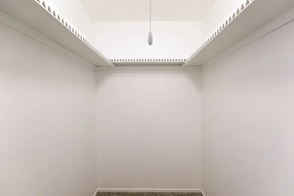 a view of a room with racks on the wall