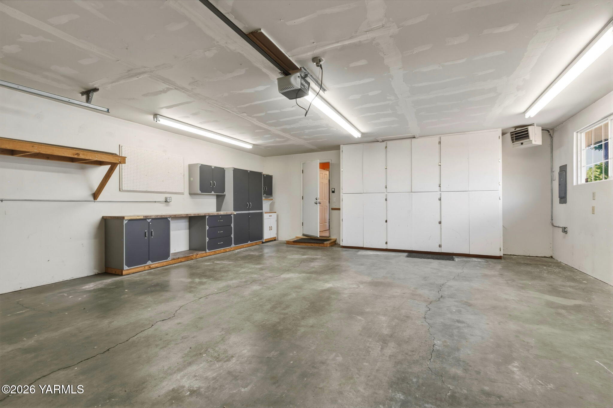 3606 Clinton Way Yakima, WA 98902 - Photo 25 of 30 Oversized Garage with shelving