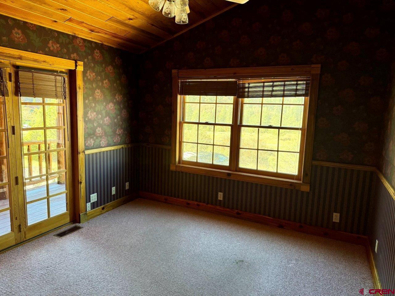 2692 County Road 17 Ridgway, CO 81432 - Photo 4 of 10 a view of an empty room with a window