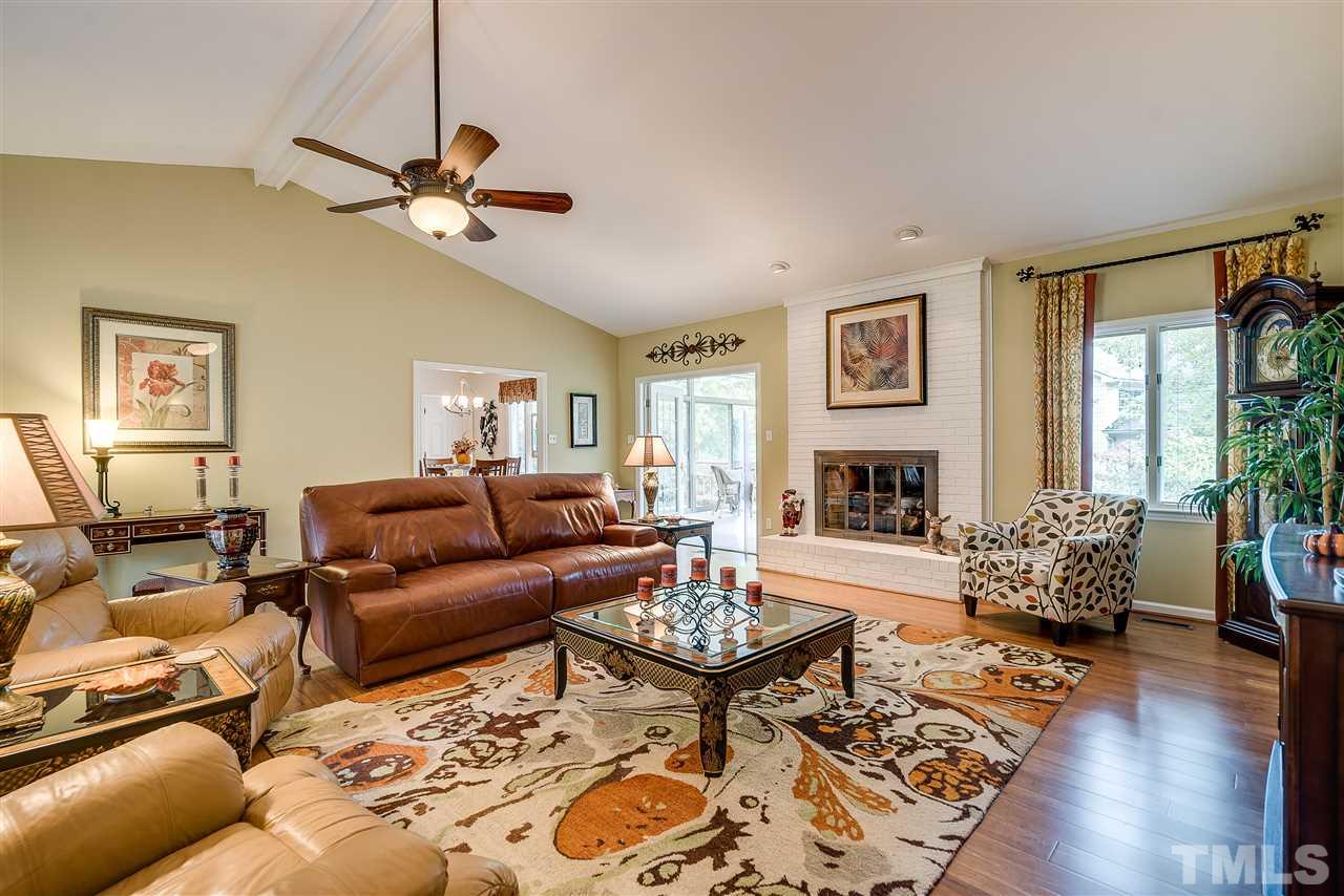 5 Chippers Way Durham, NC 27705 - Photo 4 of 25 Vaulted Ceiling, Ceiling fan, Gas logs in fireplace.