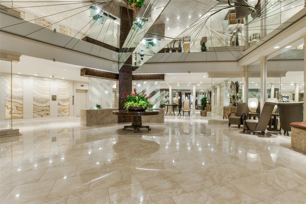 5200 Keller Springs Road, Unit 820 Dallas, TX 75248 - Photo 2 of 40 a view of a building with sitting area