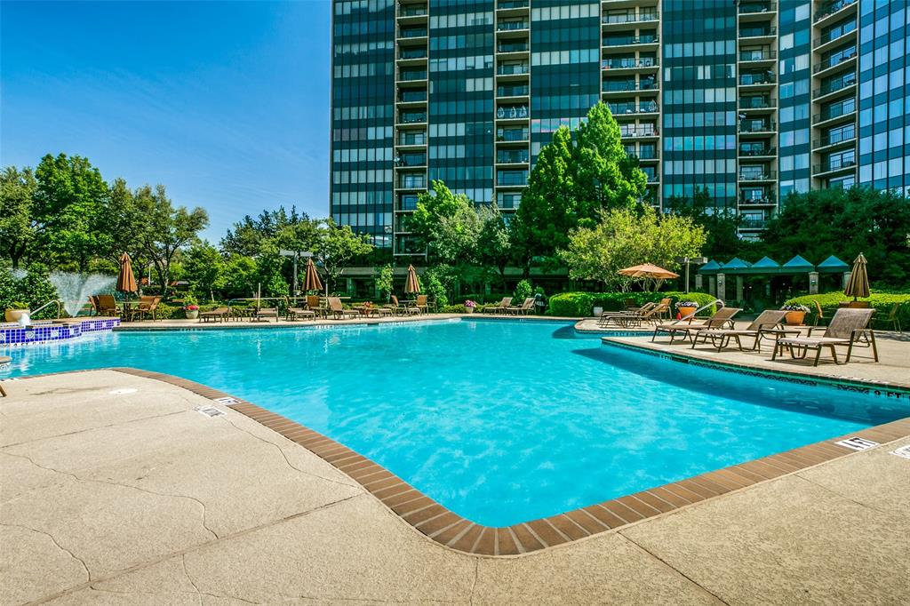 5200 Keller Springs Road, Unit 820 Dallas, TX 75248 - Photo 26 of 40 a swimming pool with outdoor seating and garden